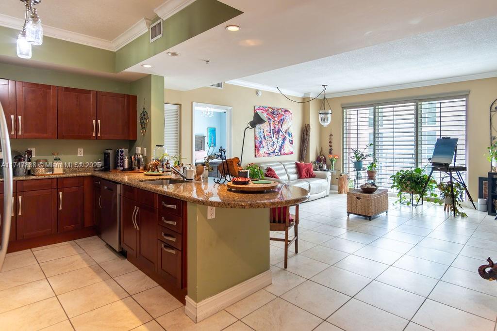 a kitchen with a sink and counter top space