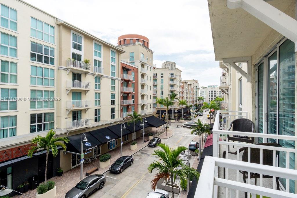 7270 Southwest 88th Street, Unit B308 Miami, FL 33156 - Photo 11 of 38 a view of tall buildings