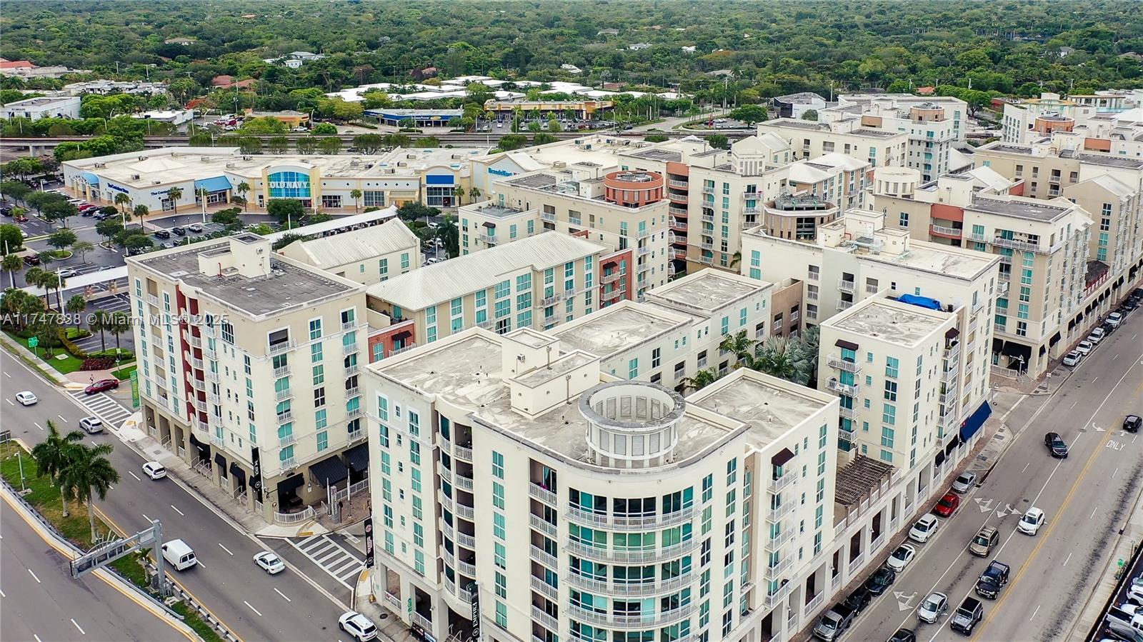 7270 Southwest 88th Street, Unit B308 Miami, FL 33156 - Photo 36 of 38 a view of a city that has tall buildings