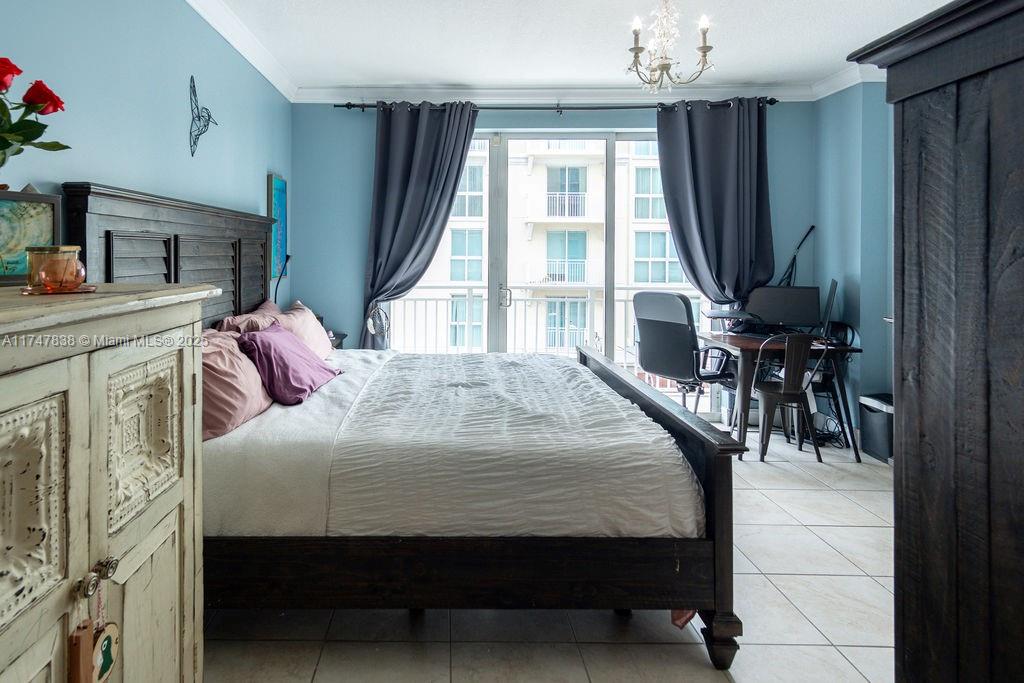 7270 Southwest 88th Street, Unit B308 Miami, FL 33156 - Photo 10 of 38 a bedroom with a bed and a window