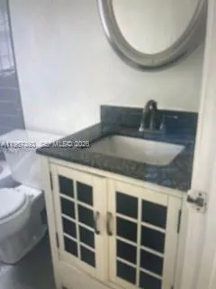 a close view of sink and mirror