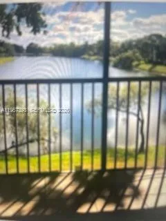 a view of a swimming pool from a balcony