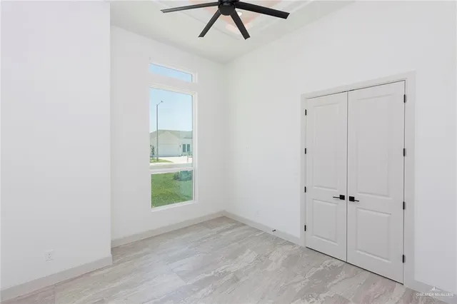 an empty room with windows