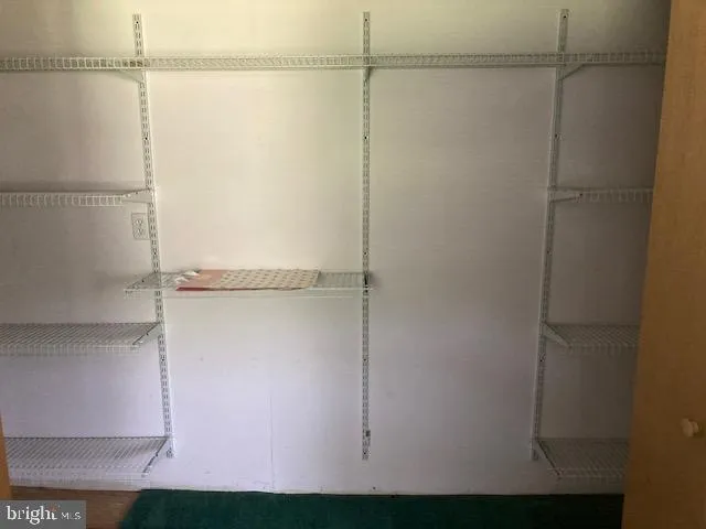 a view of a livingroom with a ceiling fan