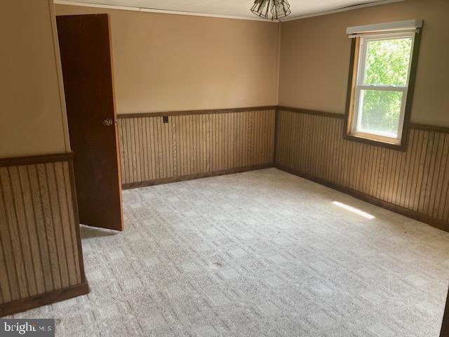 4865 Spruce Creek Road Spruce Creek, PA 16683 - Photo 20 of 46 an empty room with windows