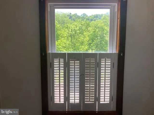 a view of entryway with a front door