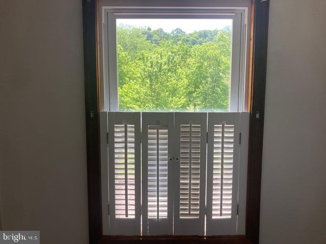 4865 Spruce Creek Road Spruce Creek, PA 16683 - Photo 27 of 46 a view of empty room with a large window