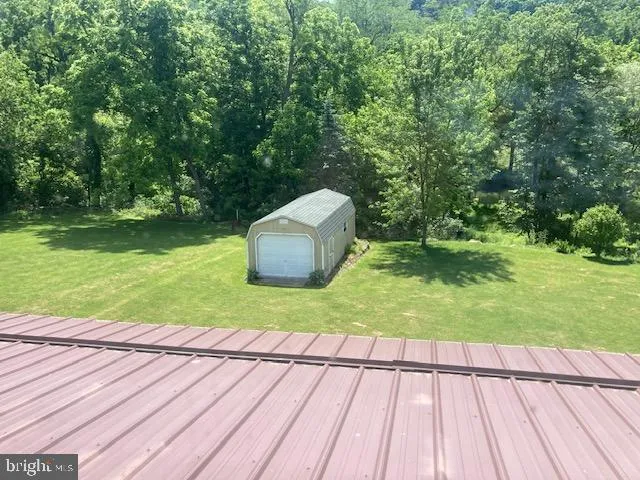 a view of a room with windows