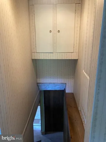 a kitchen with a sink and a stove top oven