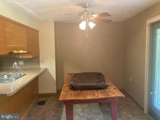 4865 Spruce Creek Road Spruce Creek, PA 16683 - Photo 10 of 46 a room with a sink and a mirror