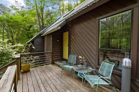 a aerial view of a house with a yard