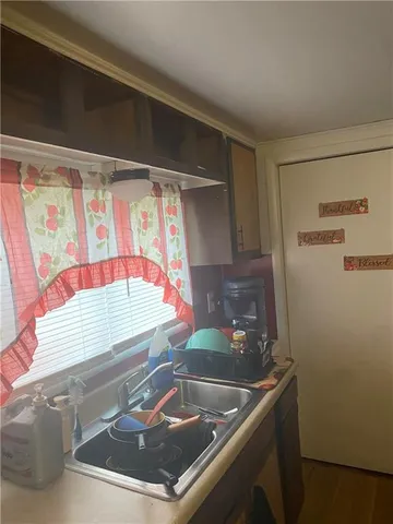 a bathroom with a sink and a shower