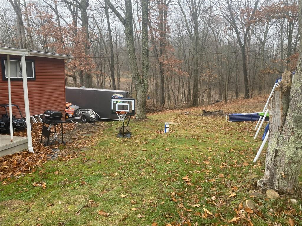 426 Wherry Road Bentleyville, PA 15314 - Photo 4 of 37 a backyard of a house with table and chairs