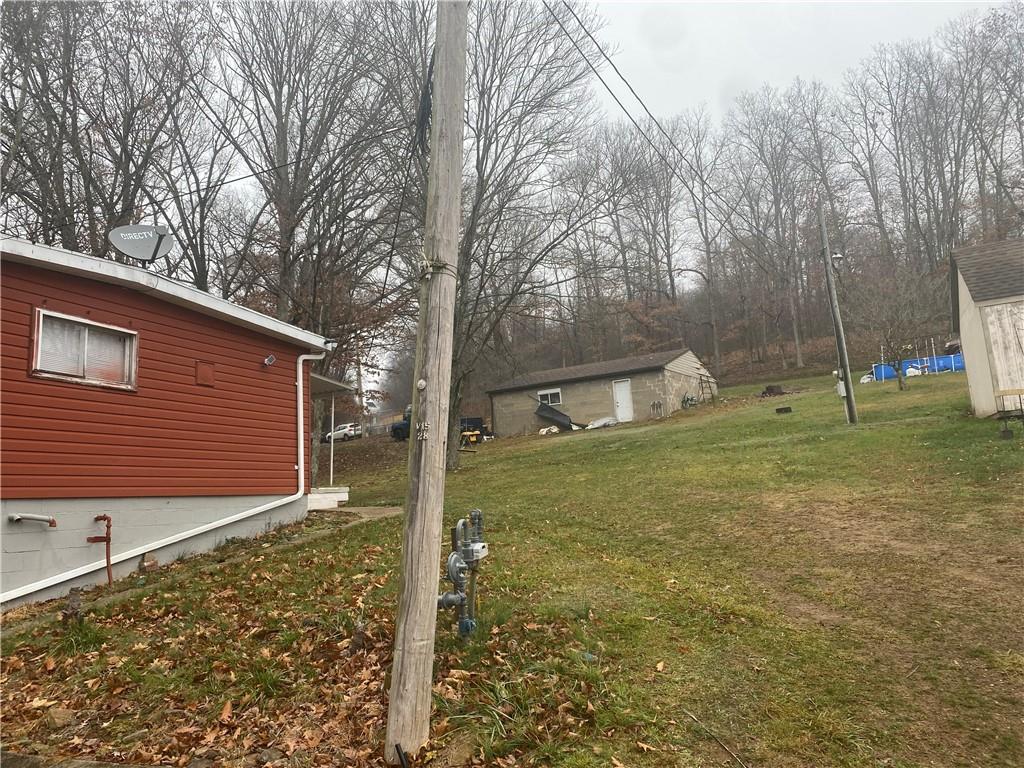 426 Wherry Road Bentleyville, PA 15314 - Photo 7 of 37 a backyard of a house with lots of green space