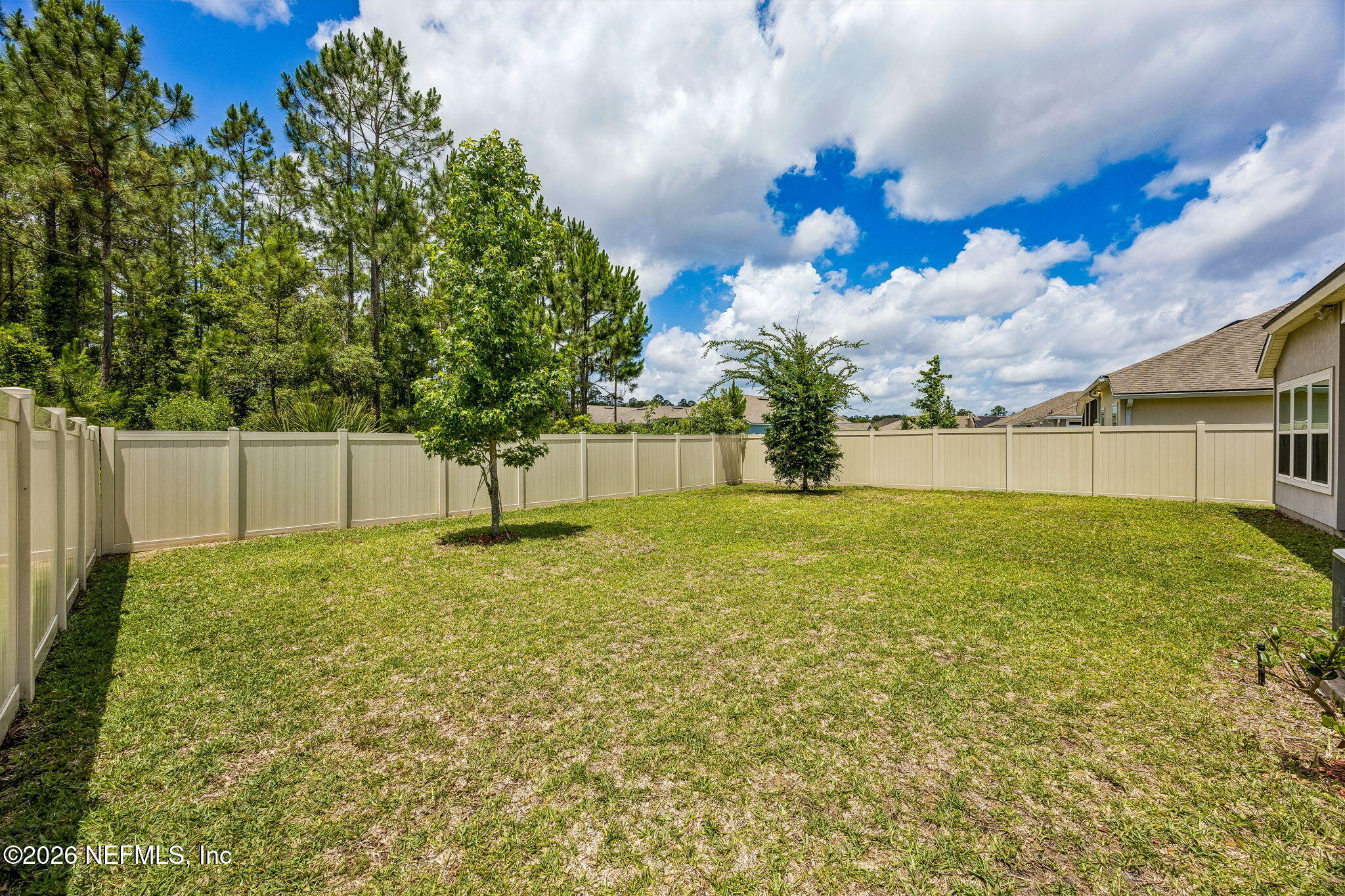 65908 Edgewater Drive Yulee, FL 32097 - Photo 37 of 49 Preserve behind fence