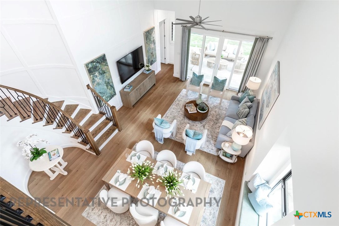 608 High Summit Drive Georgetown, TX 78628 - Photo 7 of 36 a living room with furniture and a floor to ceiling window