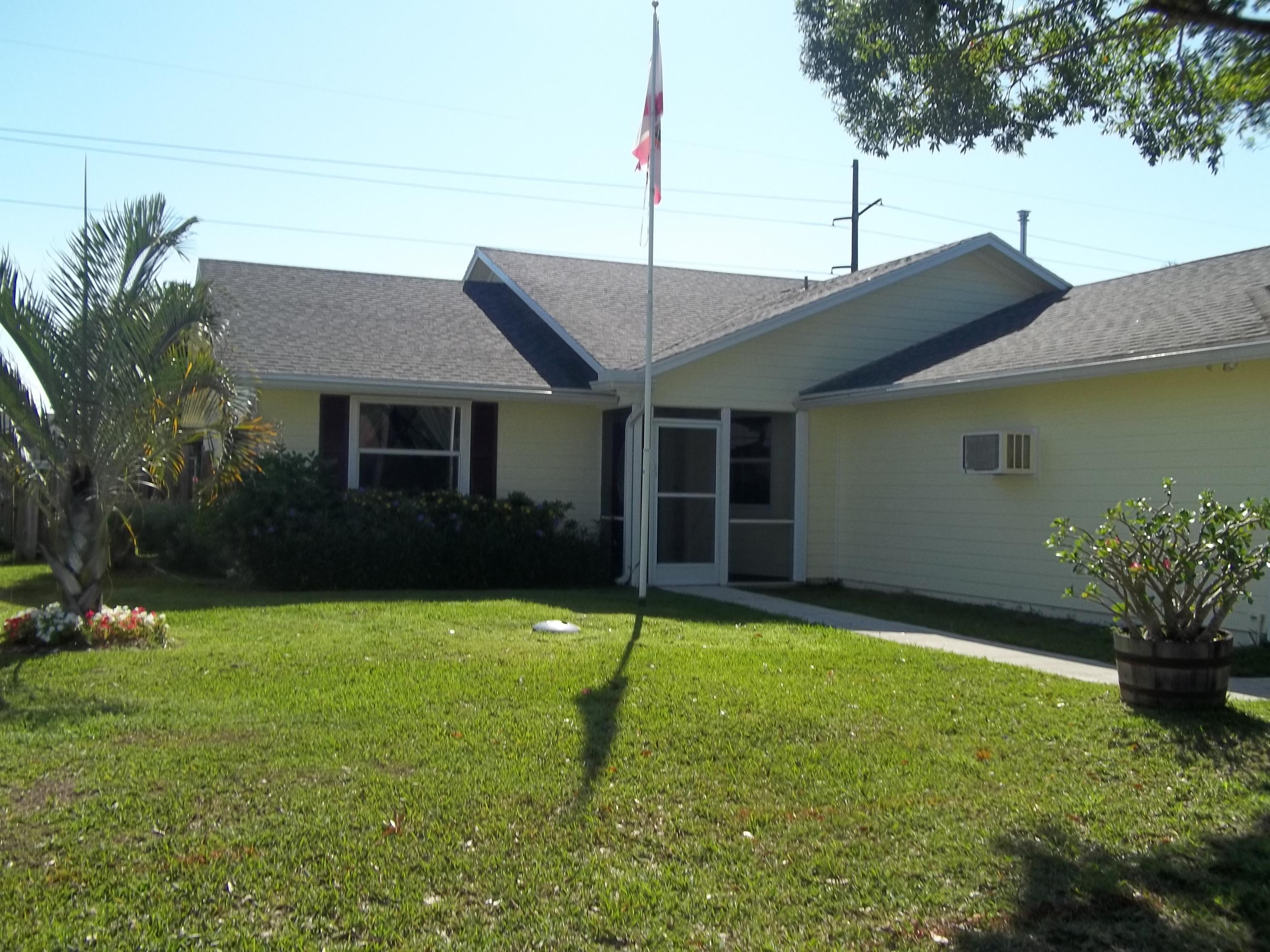 6739 Southeast Raintree Avenue Stuart, FL 34997 - Photo 1 of 20 Exterior Front