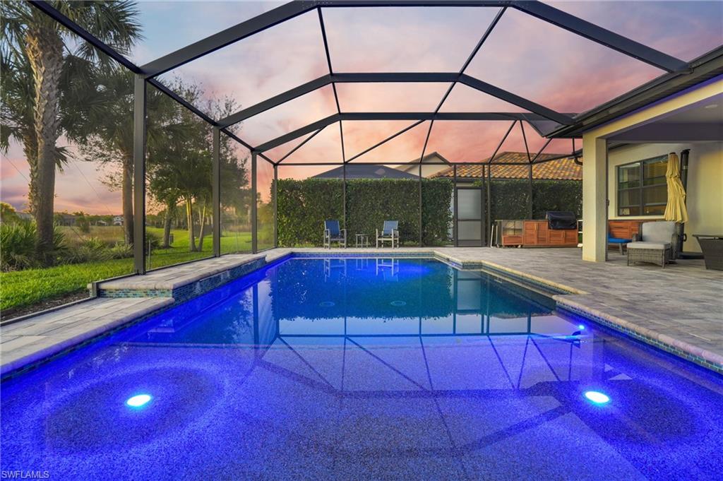 19906 Beverly Park Road Estero, FL 33928 - Photo 11 of 50 a view of yard with a patio and a yard