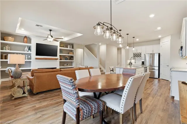a view of a livingroom with furniture and a window