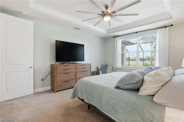 a bathroom with a granite countertop sink a large mirror and a shower