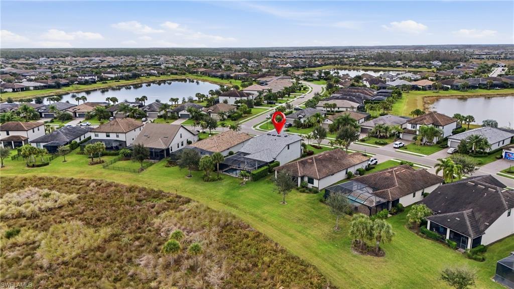 19906 Beverly Park Road Estero, FL 33928 - Photo 50 of 50 an aerial view of residential houses with outdoor space and river