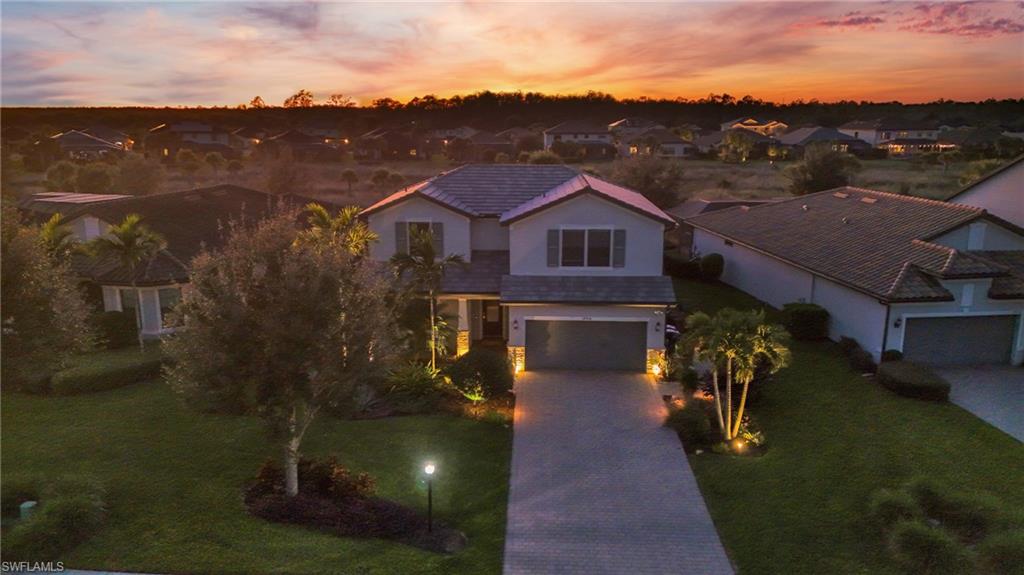 19906 Beverly Park Road Estero, FL 33928 - Photo 6 of 50 a view of multiple houses with a city street