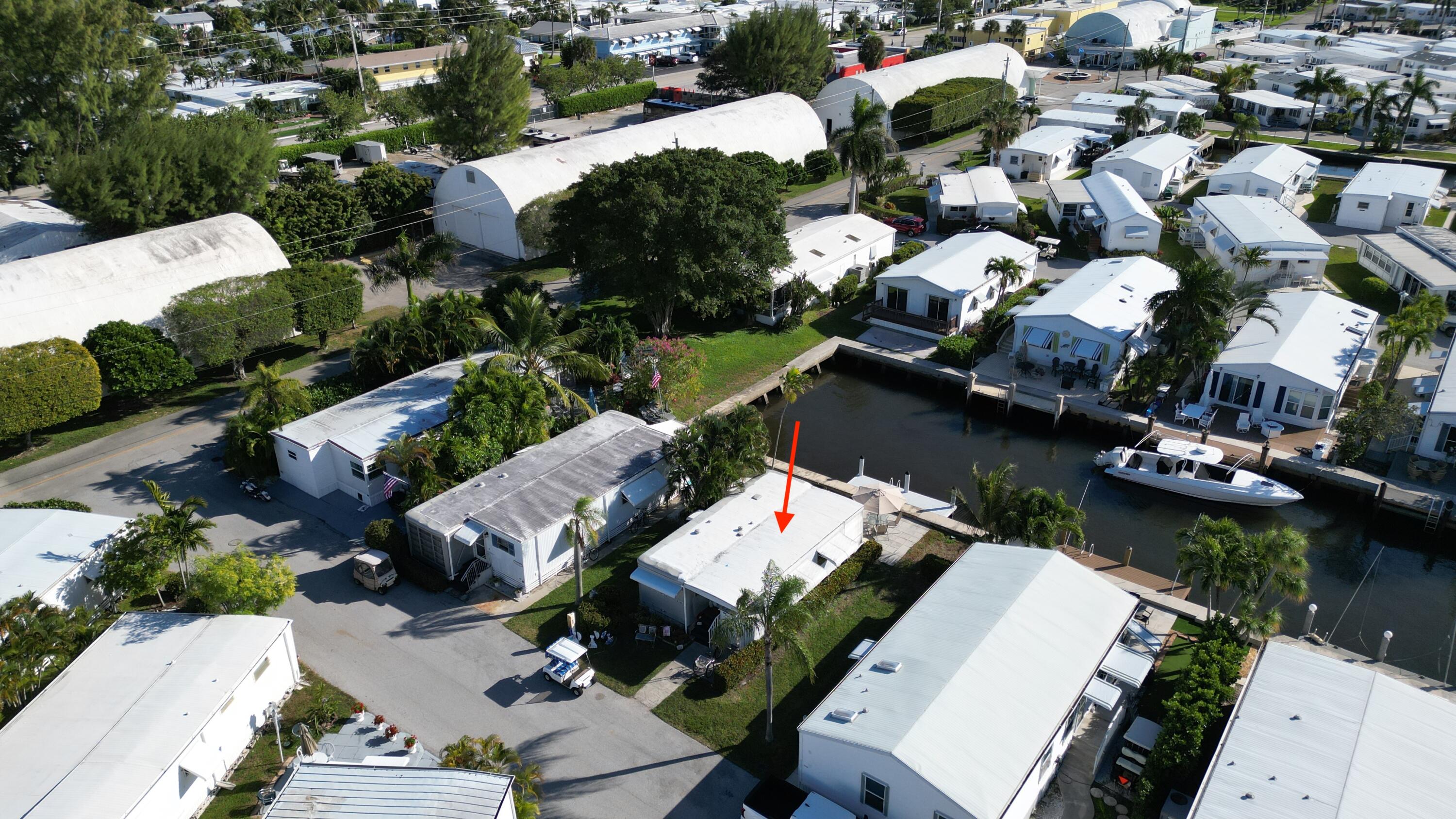 203 South Ibis Drive, Unit R Briny Breezes, FL 33435 - Photo 4 of 24 an aerial view of multiple houses with yard