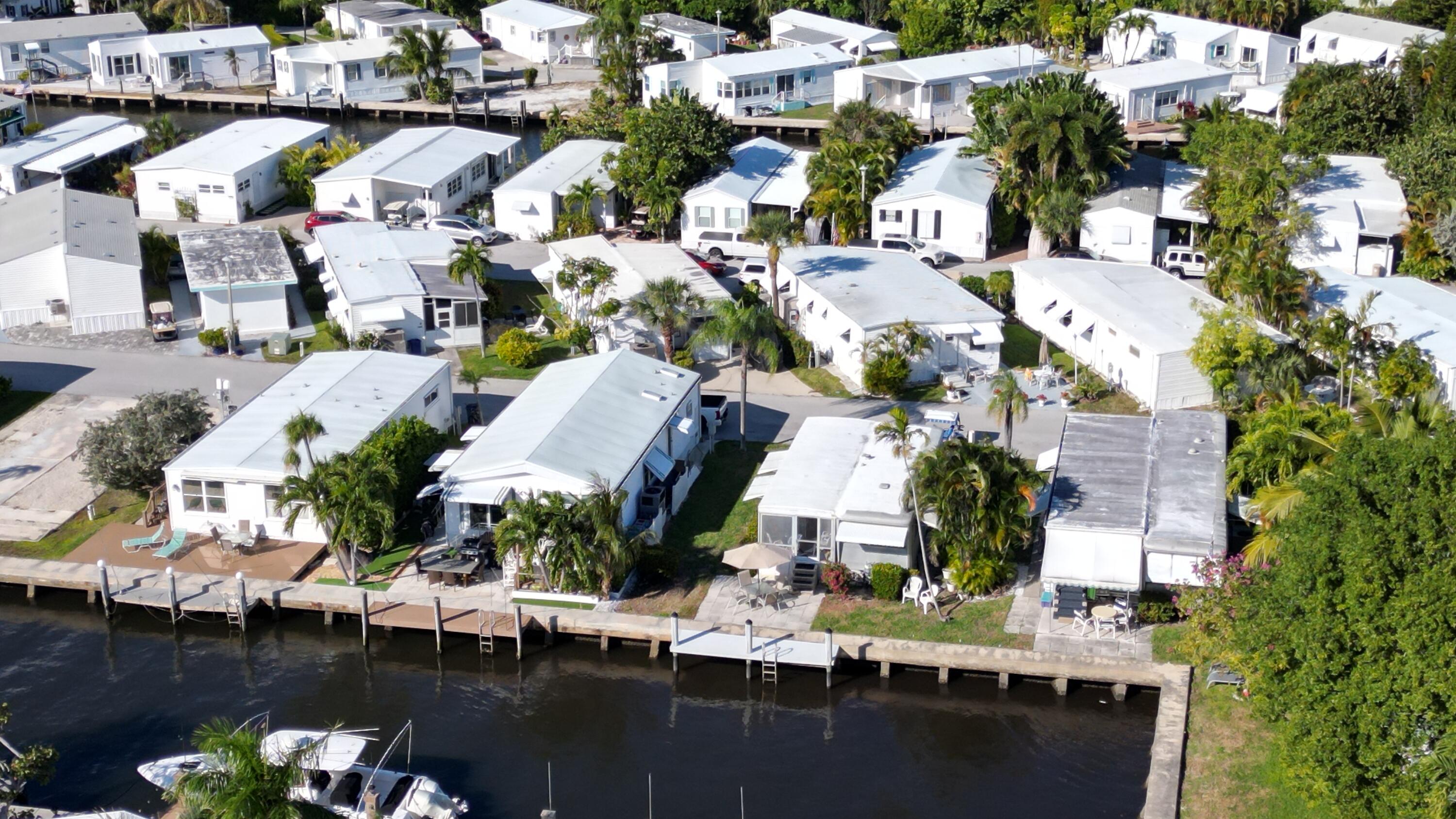 203 South Ibis Drive, Unit R Briny Breezes, FL 33435 - Photo 6 of 24 a view of multiple houses with outdoor space