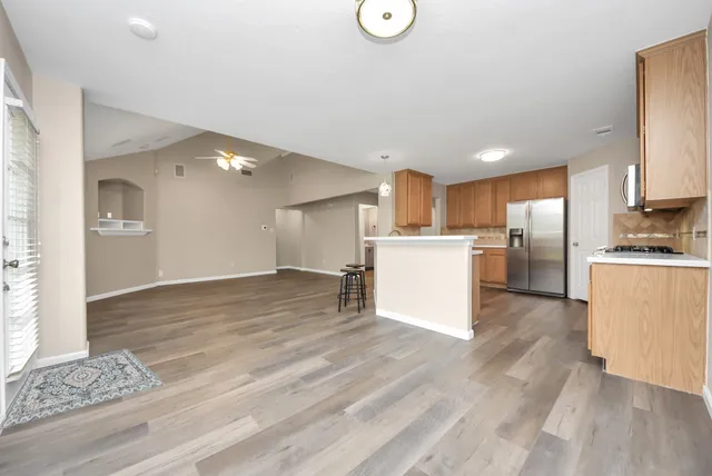 a view of kitchen with wooden floor