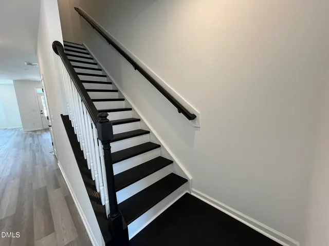 a view of entryway with wooden floor