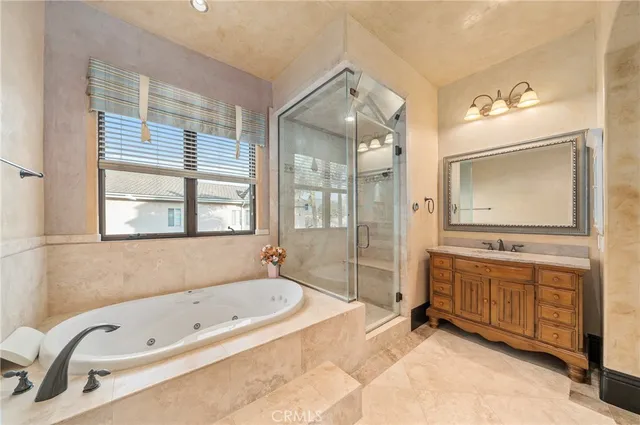 a view of a workspace with furniture and a chandelier