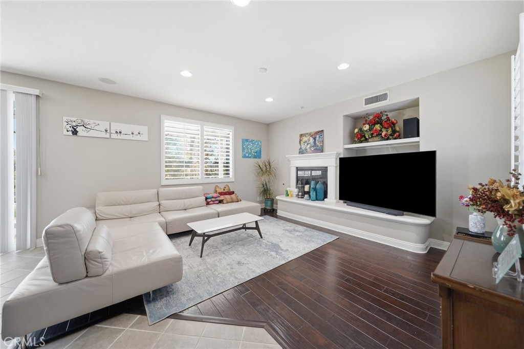 13903 Highlander Road La Mirada, CA 90638 - Photo 7 of 65 Family room with cozy fireplace