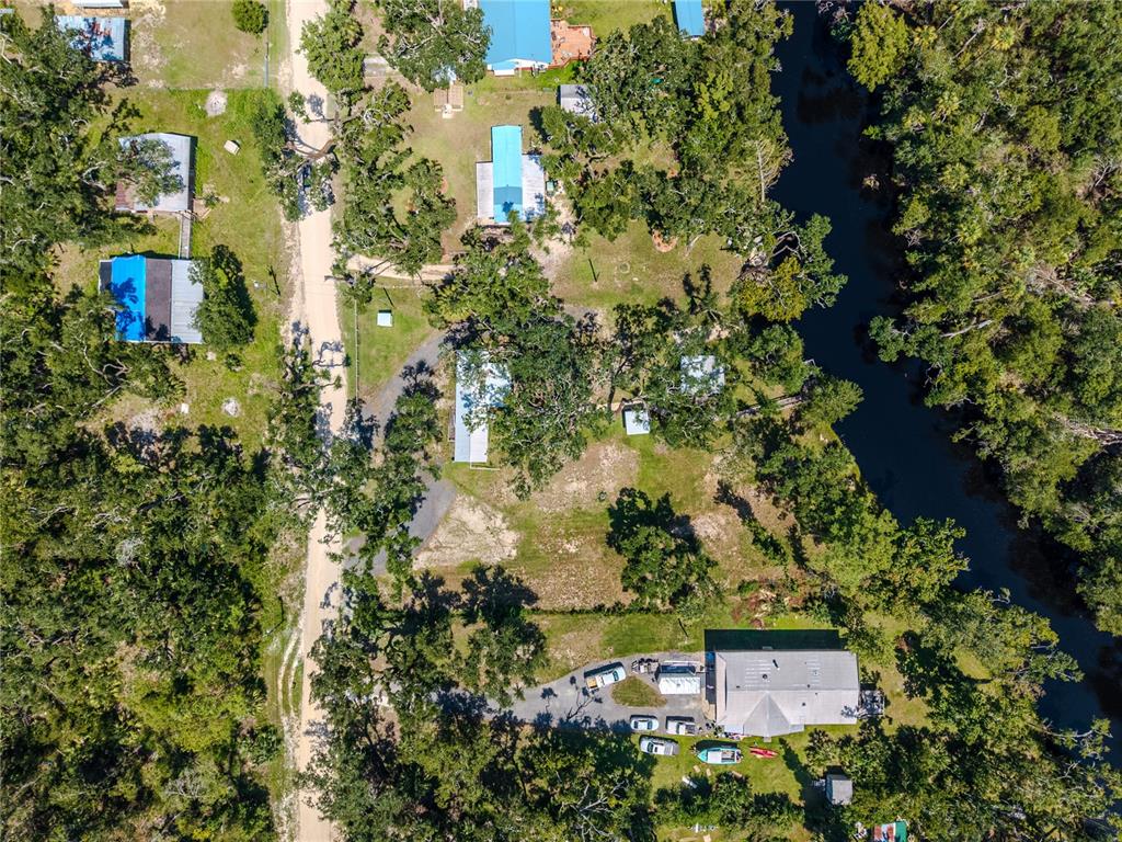 2008 River Road Steinhatchee, FL 32359 - Photo 2 of 41 an aerial view of a house with a yard