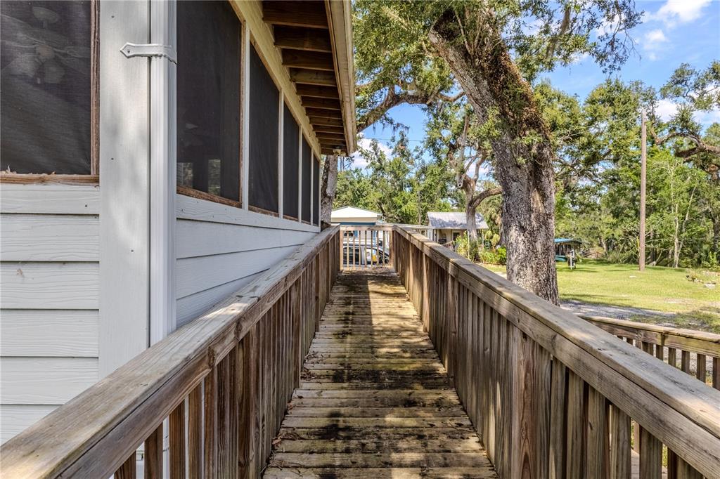 2008 River Road Steinhatchee, FL 32359 - Photo 26 of 41 a view of a balcony with trees
