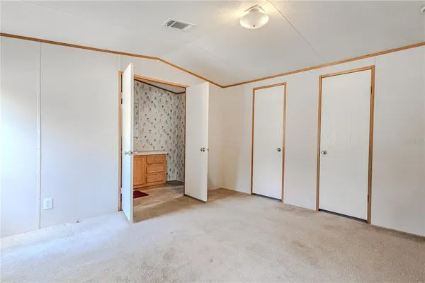 a kitchen with stainless steel appliances granite countertop a stove a sink dishwasher and a refrigerator