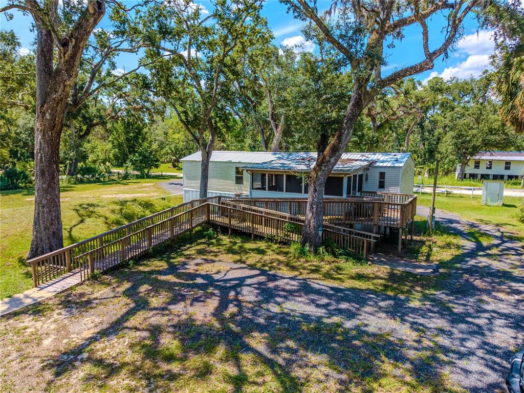 2008 River Road Steinhatchee, FL 32359 - Photo 9 of 41 an aerial view of a house with swimming pool and large trees