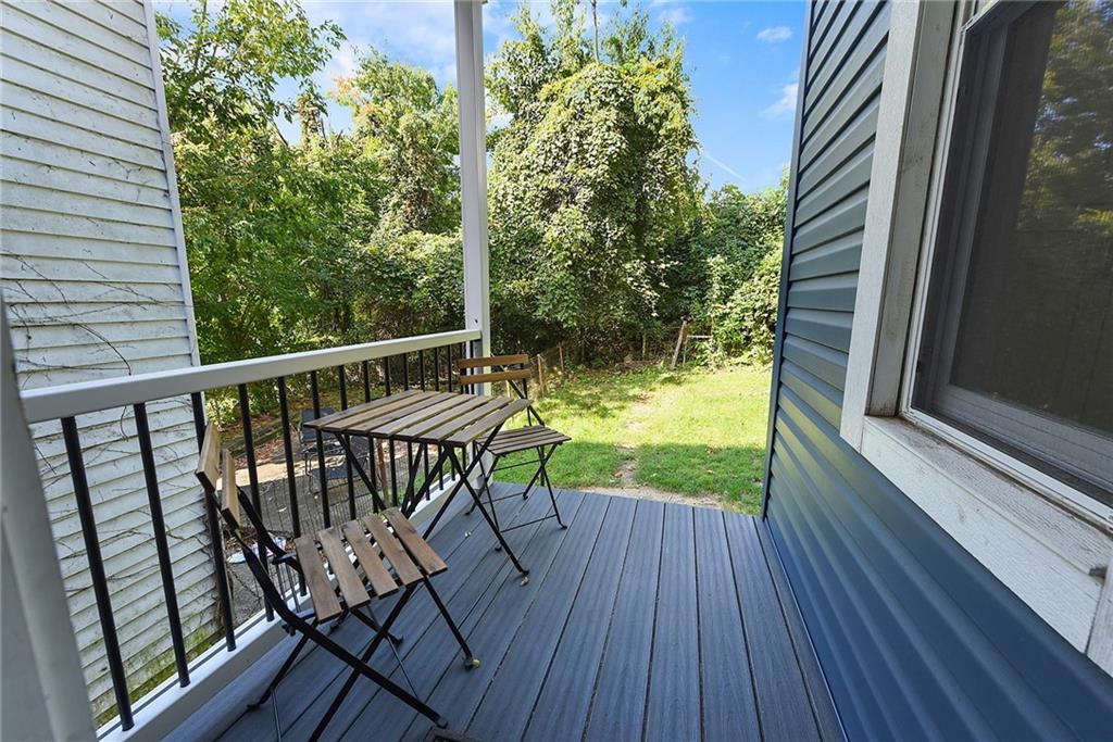 22 Millbridge Street Pittsburgh, PA 15210 - Photo 25 of 25 a view of a balcony with wooden floor