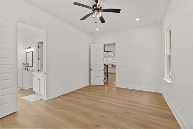 a white bath tub sitting in a bathroom