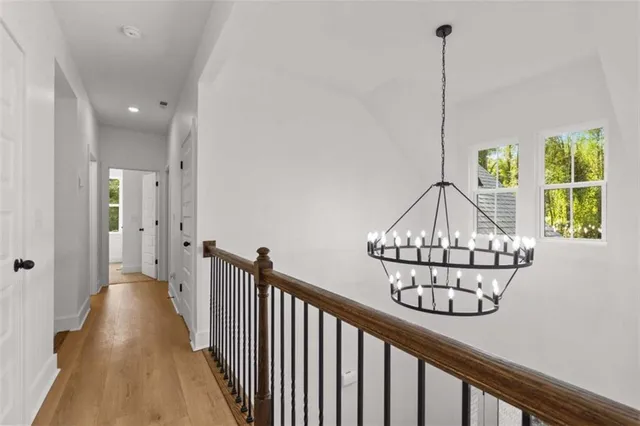 a bathroom with a toilet a sink and a mirror