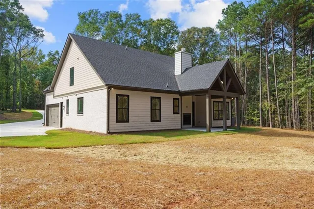 a view of a garden with a tree