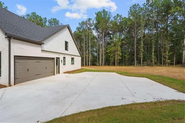 a view of a street with a tree