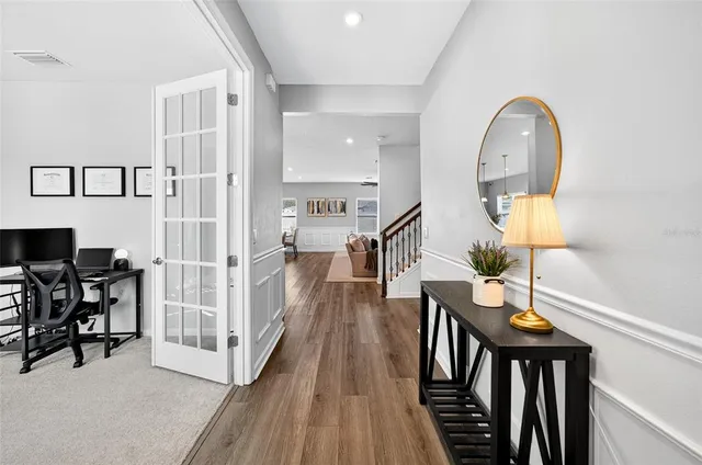 a view of livingroom with furniture and wooden floor