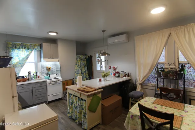 a kitchen with sink and stove