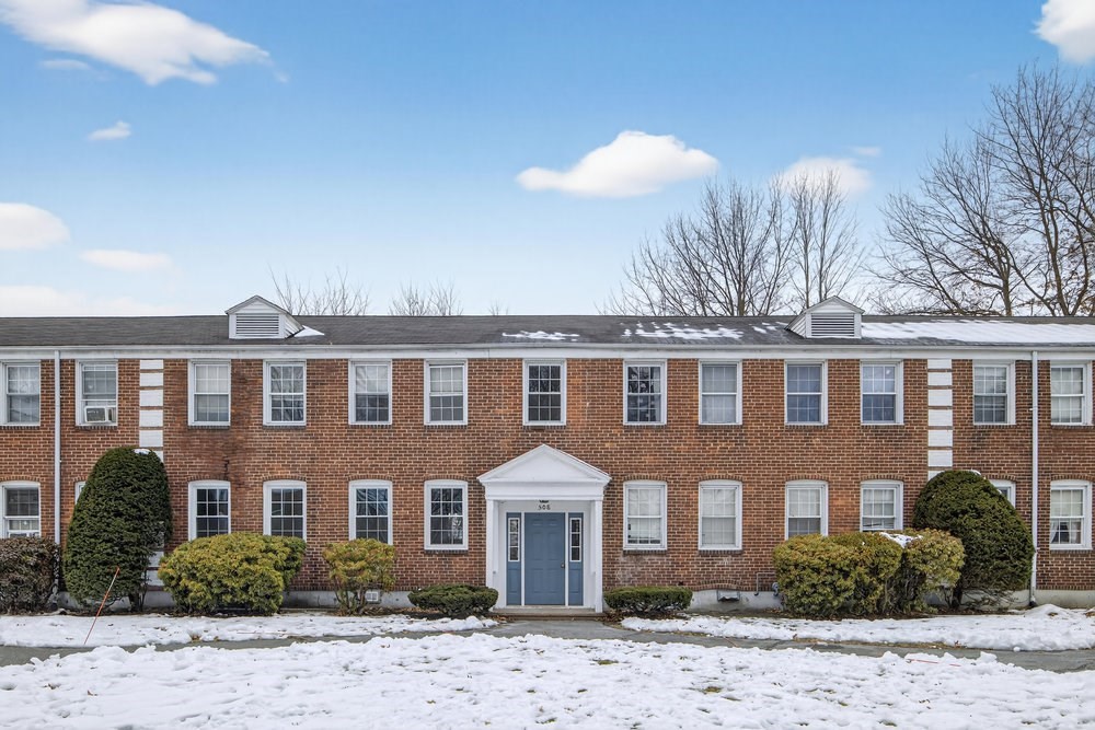508 Cold Spring Avenue, Unit 1A West Springfield, MA 01089 - Photo 1 of 27 a front view of a house with a yard