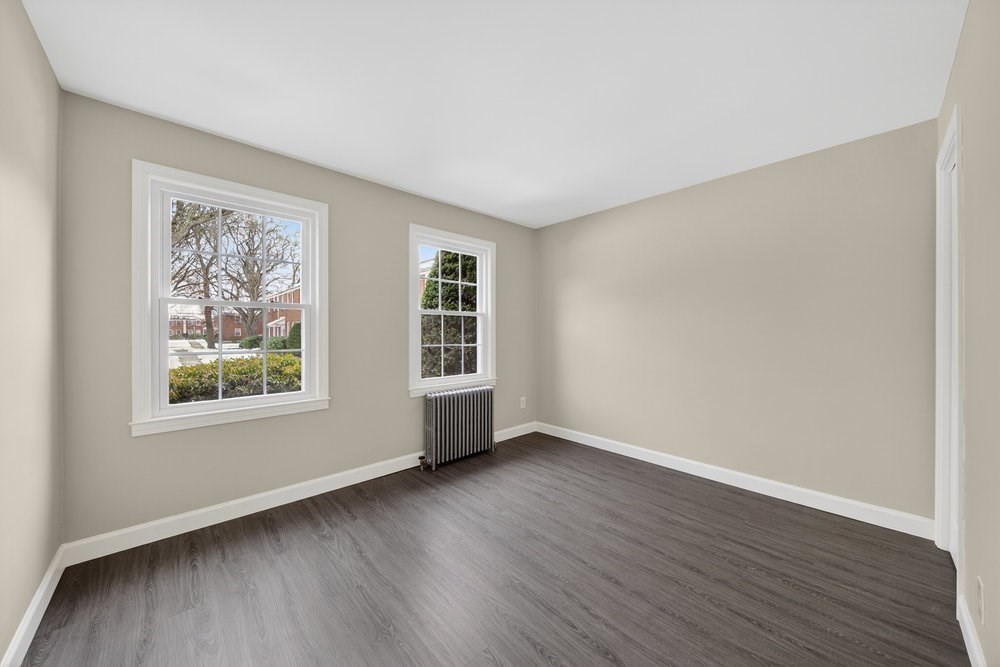 508 Cold Spring Avenue, Unit 1A West Springfield, MA 01089 - Photo 15 of 27 a view of an empty room with wooden floor and a window
