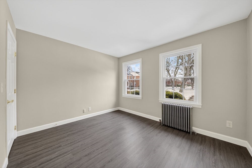 508 Cold Spring Avenue, Unit 1A West Springfield, MA 01089 - Photo 18 of 27 a view of an empty room with window and wooden floor