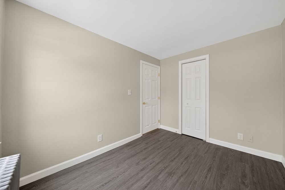 508 Cold Spring Avenue, Unit 1A West Springfield, MA 01089 - Photo 20 of 27 a view of an empty room with wooden floor