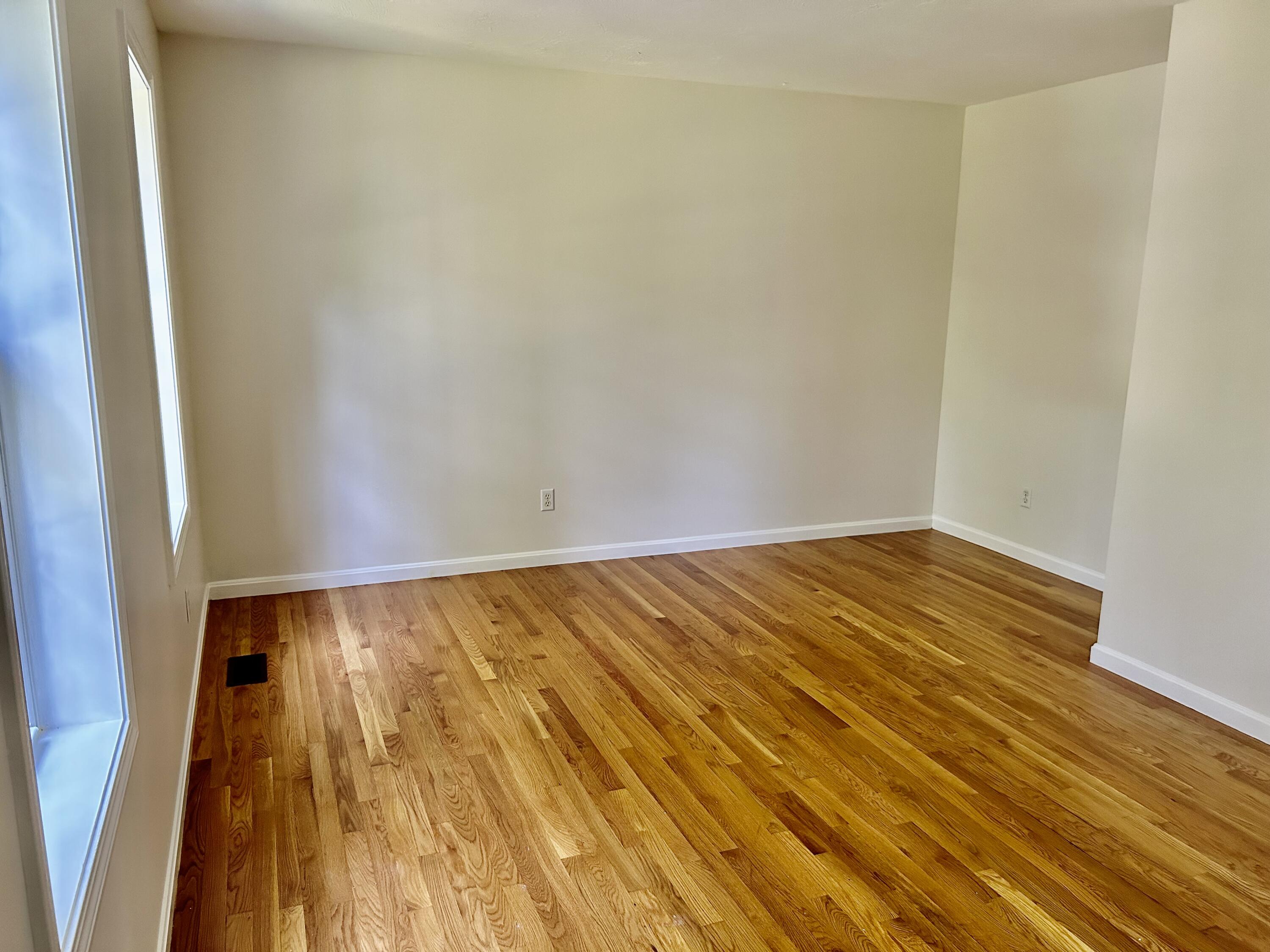 121 Old Post Road Centerville, MA 02632 - Photo 11 of 39 a view of wooden floor in a room