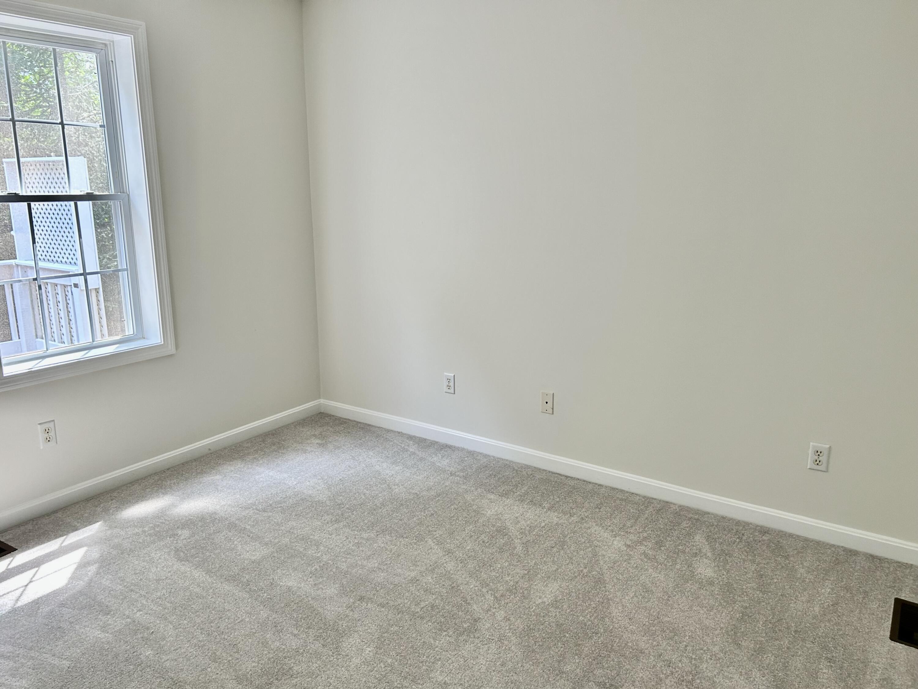 121 Old Post Road Centerville, MA 02632 - Photo 13 of 39 an empty room with a window