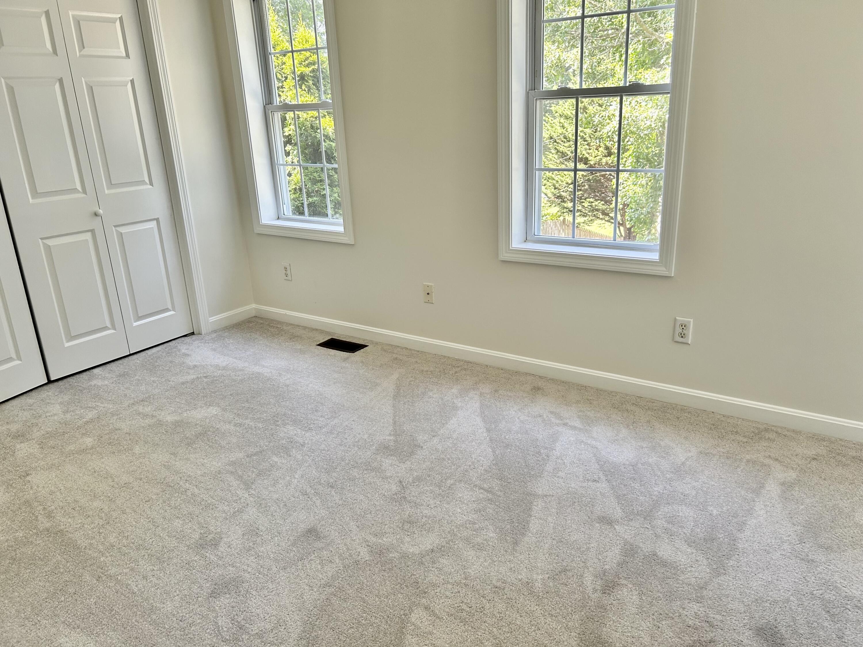 121 Old Post Road Centerville, MA 02632 - Photo 18 of 39 an empty room with windows